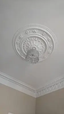 a white ceiling with a chandelier in a room at Murrayfield Spacious 2-bedroom apartment in Edinburgh