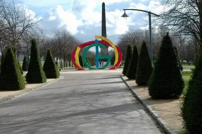 a road with a large arch in a park at The Stables - Fabulous stylish flat in Merchant City & Free Secure Parking in Glasgow