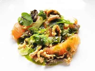 a plate of food on a white background at Achray House Restaurant with Rooms in Saint Fillans