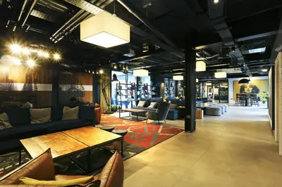 a lobby with couches and tables in a store at JOIVY at VITA Fountainbridge - Adults only - Breakfast buffet in Edinburgh