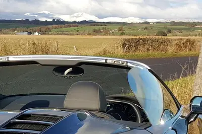a car parked on the side of a road at Thornhill House - Historic 5 Bedroom 5 Ensuite in Stirling
