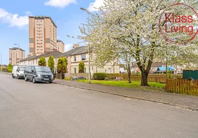a street with cars parked on the side of the road at Anderson Apartment by Klass Living Motherwell in Motherwell