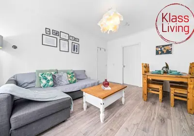 a living room with a couch and a table at Anderson Apartment by Klass Living Motherwell in Motherwell