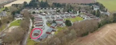 an aerial view of a parking lot with a red circle at Grandeagles Extra large lodge in Auchterarder