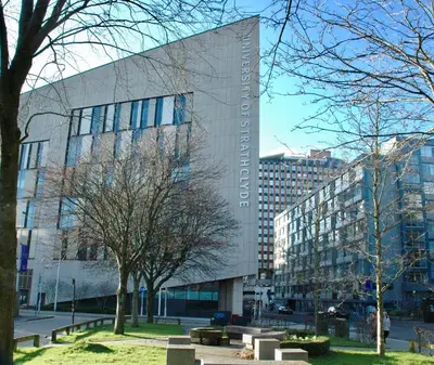 a large building with trees in front of it at The Cluthar - Ground Floor West End City Centre Rockvilla flat & Parking in Glasgow