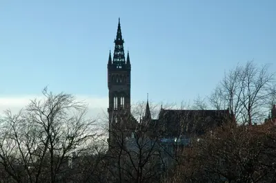 a tall tower with a clock on top of a building at The Cluthar - Ground Floor West End City Centre Rockvilla flat & Parking in Glasgow