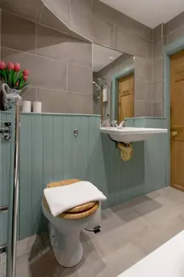 a bathroom with a toilet and a sink at Frederick Street - stylish apartment in the heart of New Town! in Edinburgh