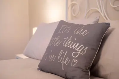 a pillow that says its the little things no life is at ArcView - SEC Hydro Two Bed Flat With Free parking and Great View in Glasgow