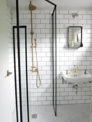 a bathroom with a shower and a sink at Mews Cottage Ardoch Lodge Strathyre in Strathyre