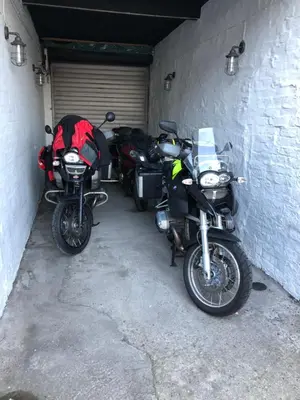 a group of motorcycles parked in a garage at The Royal Hotel in Stranraer