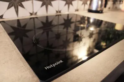 a tablet sitting on top of a kitchen counter at Boutique Bothy - Unique Bolthole in the New Town in Edinburgh
