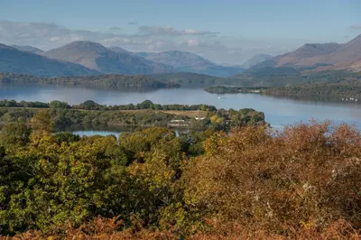 a view of a lake with mountains in the background at Rowardennan Youth Hostel in Rowardennan