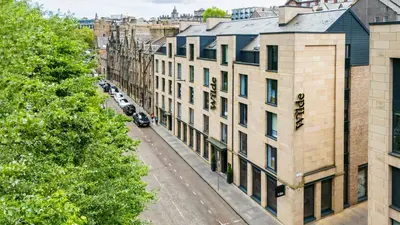 an aerial view of a city street with buildings at Wilde Aparthotels Edinburgh Grassmarket in Edinburgh