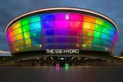 a large building with a rainbow colored at Glasgow City Centre - The PENTHOUSE with RiverViews - (Duplex, 3 Bedrooms, 3 Bathrooms, 2 Living rooms/Kitchen, Private SKY Terrace, 2 Parkings, Top Floor, Huge - 2100 sq ft, SECC HYDRO) in Glasgow