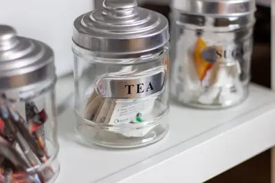 four glass jars sitting on a shelf at The Neuk in Uphall