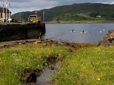 two people in kayaks in a body of water at Puffin - Kerrera in Lerags