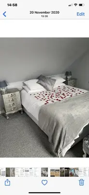 a picture of a bedroom with a bed at GROOMS COTTAGE OUTSIDE HOT TUB in Beith
