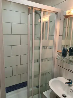 a bathroom with a shower and a sink at B&B Drum Farm in Stirling