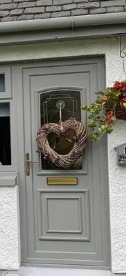 a wreath on the door of a house at Fab-u-Luss in Luss