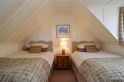 two beds in a room with a attic at Darroch Beag in Saint Catherines