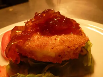 a piece of food on a plate with sauce at Argyll Hotel in Bellochantuy