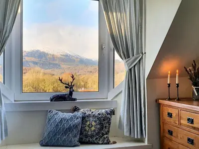 a window with a view of a mountain at Ben Ledi View in Callander