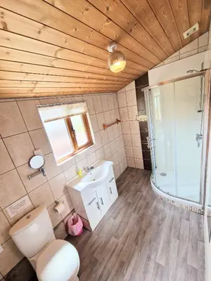 a bathroom with a toilet and a sink and a shower at Lomond 4 with Private Hot Tub - Fife - Loch Leven - Lomond Hills in Kelty