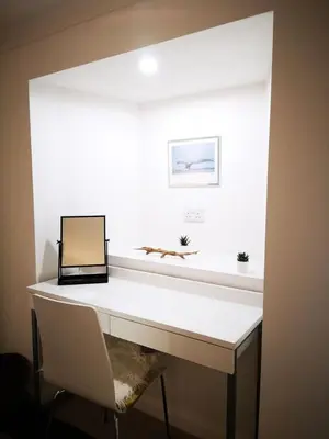 a white desk with a laptop on top of it at Imperial Apartment in Oban