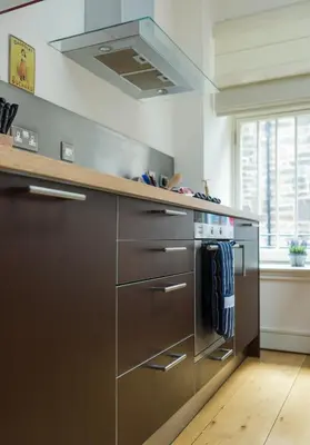 a kitchen with a stainless steel stove top oven at Thistle Street - 401 in Edinburgh