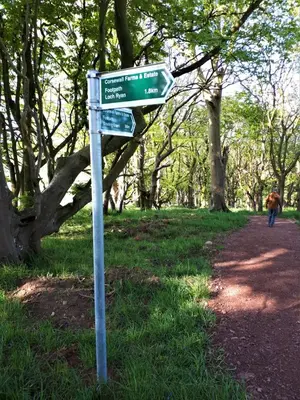 a street sign on a path in a park at Corsewall Arms Guest House in Stranraer