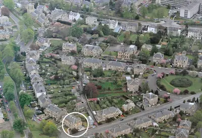 an overhead view of a city with houses and roads at Kingsview Apartment in Stirling