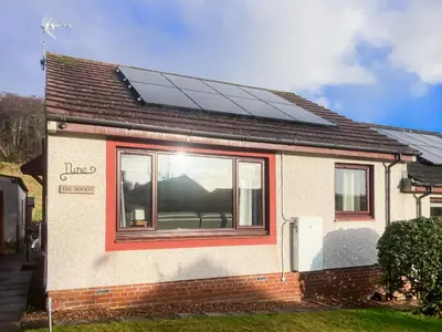 a house with solar panels on the roof at The Hoolit in Crieff