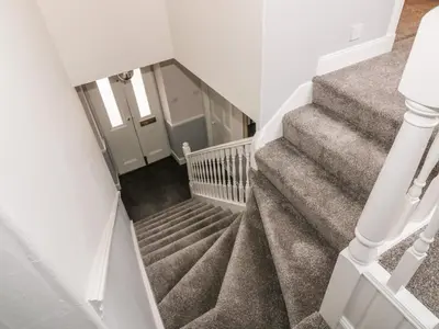 an overhead view of a staircase with grey carpet at Ivy Bank in Thornhill