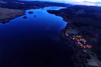 an aerial view of a river at night at Fern Lodge in Dalavich