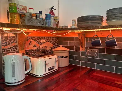 a kitchen with two toasters on a counter top at North Lodge Kilmun in Kilmun