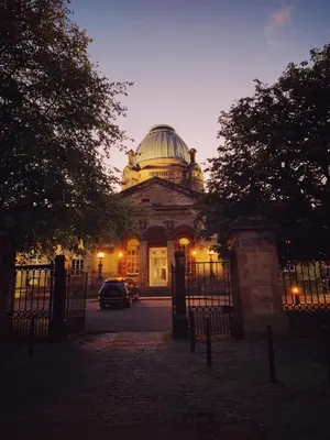 a building with a dome on top of it at Oakshaw Apartment in Paisley