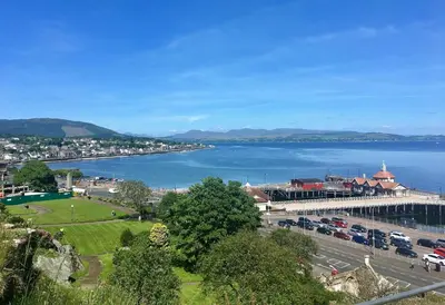 a city with a bridge over a body of water at Freeland Cottage in Dunoon
