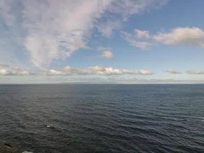 a large body of water with a cloudy sky at South Segganwell - Culzean Castle in Maybole