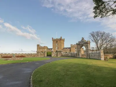 an image of a castle with a grass yard at South Segganwell - Culzean Castle in Maybole