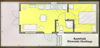 a floor plan of a bathroom with a toilet at Rashfield Sheilings - Quiet Riverside Lodges for Couples near Pucks Glen in Dunoon