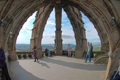 a group of people standing at the top of a tower at 1 Bed House - Central Free Parking Wifi in Stirling