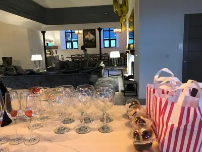 a table with wine glasses on top of it at East Church House, Unique 9 bedroom Church, Historic Market Town. in Strathaven