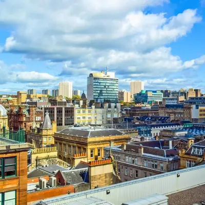 a view of a city skyline with buildings at Stunning 2 bed property in heart of West End in Glasgow