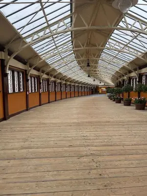 an empty hallway of a building with a large ceiling at Our Wee Getaway in Rothesay