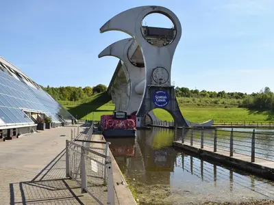a large monument in the middle of a river at Bumbles Barn in Slamannan