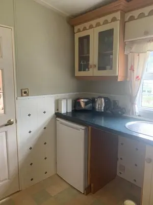 a kitchen with a counter top and a sink at The Monaco 32 in Dunoon