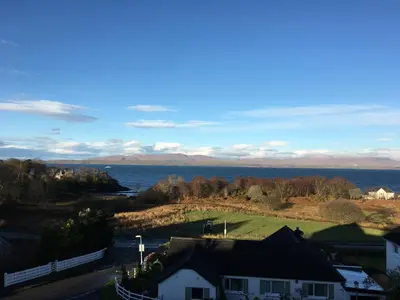 a view of the ocean from a house at Brecbennoch in Oban