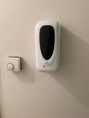 a wall with avr on the side of a wall at Dada House in Glasgow