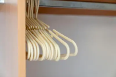 a bunch of white forks hanging from a rack at Saughton Suite with views of Water of Leith in Edinburgh