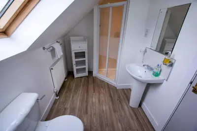 a bathroom with a sink and a toilet at Corran Bunkhouse in Onich